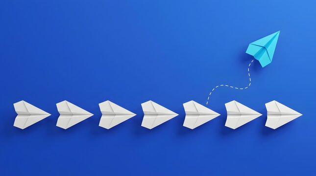 Blue paper airplane breaks away from a line of white paper airplanes flying in the same direction on a blue background symbolizing individuality and