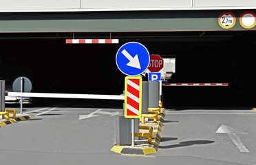 Automatic boom barrier and road sign © Unkas Photo