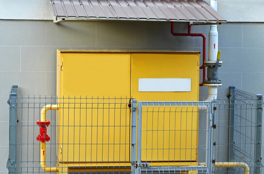 Gas distribution cabinet beyond the fence