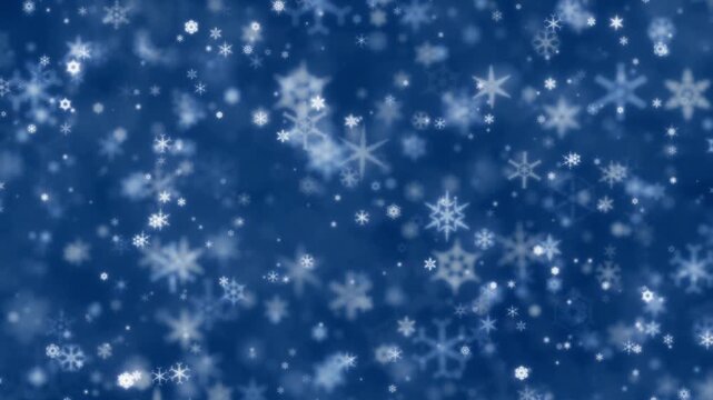 Winter scene of glowing snowflakes sparkling on blue background. Snowflake backgrounds with twinkling snow flakes creating cold wintry atmosphere. Soft snowflakes for winter or Christmas background.