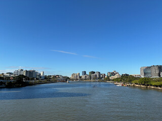 Fototapeta premium Brisbane River and modern waterfront skyline on a sunny day