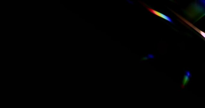 Angled lights shining in a precious gem for brilliant colors and a sparkling aura of luxury. Beaming light reflection creating a visual effect of glamorous dazzling rainbows for soft dreamy lighting.