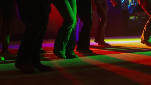 Country Line Dancing in Boots on Dance Floor in Slow Motion