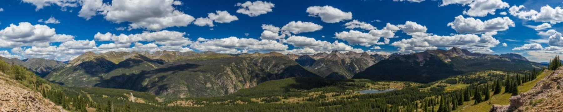 Mountain vista panorama with afternoon clouds