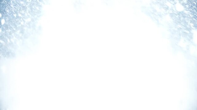 Heavy blizzard snowstorm blowing across bright winter landscape during extreme weather conditions in motion video footage