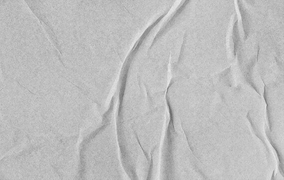 White glued paper texture with deep creases, wrinkles, folded edges, subtle grain, distressed surface, and blank poster template background