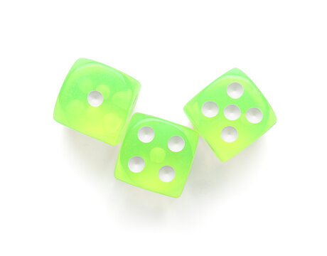 Green game dices on white background