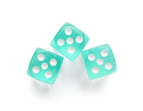 Turquoise game dices on white background