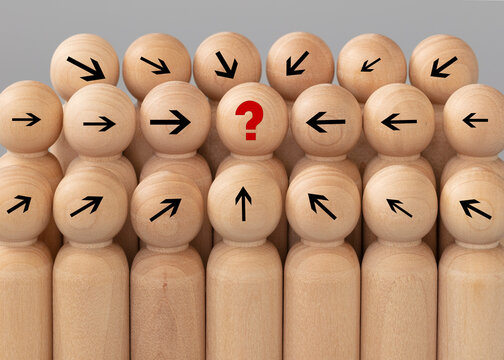 I didn't understand, concept. Wood figures simulate crowd, people together, unity concept on grey  background. Front view, closeup. No idea.