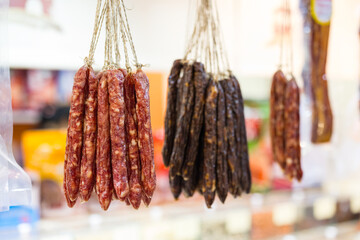 Fototapeta premium Traditional meat sausage hanging in a local market