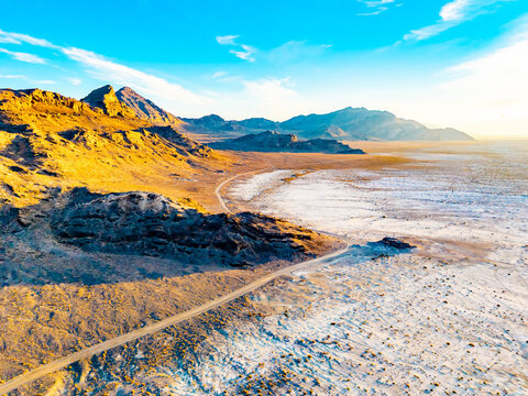 Aerial view of mountain ridges and salt flats in Utah