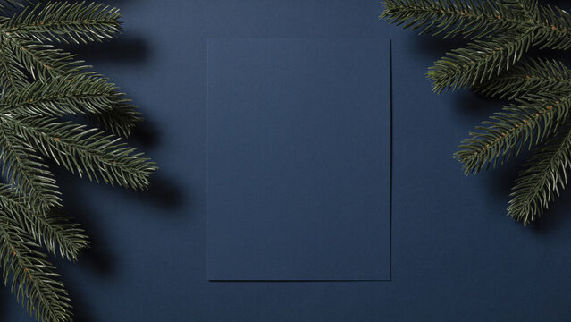 Father's Day greeting card background navy background with pine branches and open lettering space. Space reserved for text