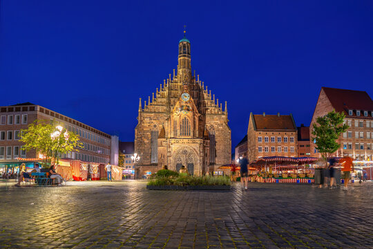 Stunning evening view of  the Gothic Frauenkirche church at the main market square in Nuremberg