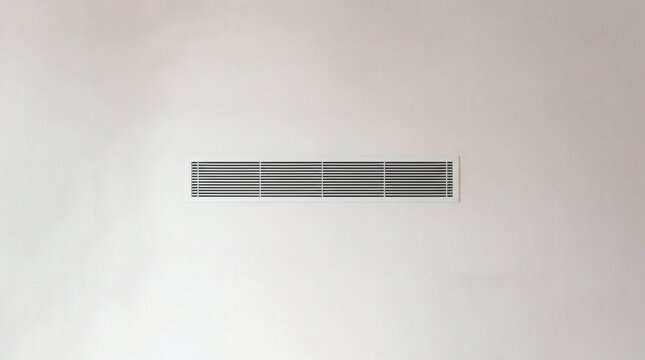 Minimalist gray ventilation grille on a white wall background.