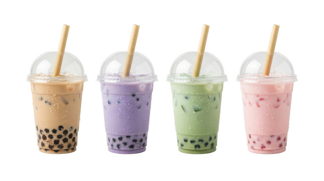 Four colorful bubble tea drinks with tapioca pearls in plastic cups on white background