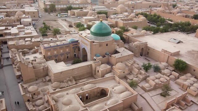 Old town of Khiva, oriental oasis city, clay buildings, alleys and colourful domes, Khiva, Uzbekistan