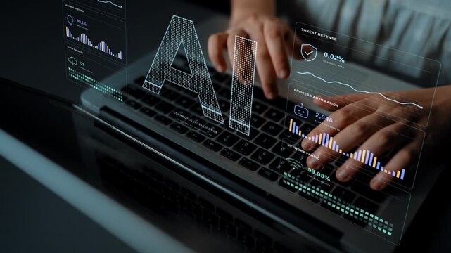 Hands type on a laptop. AI infrastructure brings distributed resources, analytics and security together, showing how connected systems contribute to operational intelligence.