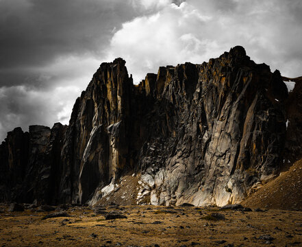 Jagged Cathedral Park cliffs beneath dark dramatic clouds