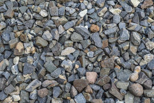 Top view close up texture of crushed stone ballast rocks