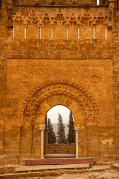 Carved Sandstone Gateway with Horseshoe Arch and Kufic Inscription Bands in Tlemcen