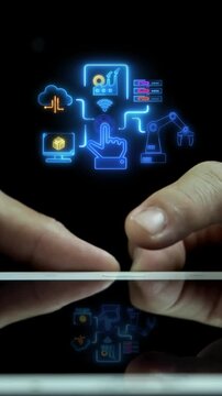 Businessman hands operating digital tablet vertical shot with glowing smart factory automation network. Industrial robotics workflow control, manufacturing system, and technology process concept.