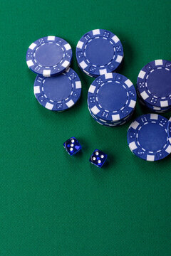 Multicolored casino chips as a conceptual backdrop for gambling games like poker, blackjack