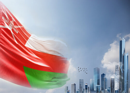 Oman national flag waving in sky with modern building skyline. Oman national flag for independence day.