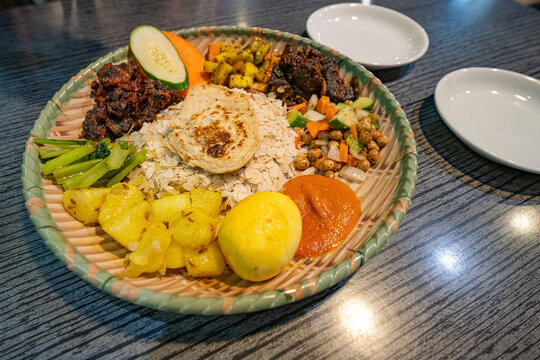 Traditional Newar Samay Baji feast served on a large plate