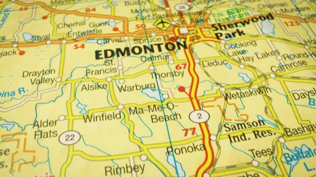 Road network leading to Edmonton, Canada &ndash; gliding view over an atlas map