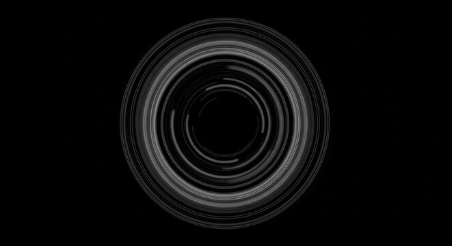 Abstract circular motion trails of white light streaks forming concentric rings and a vortex pattern isolated on a solid black background, long exposure photography style.