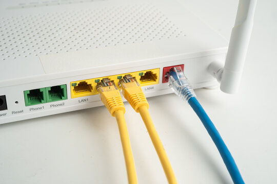 Ethernet cable with wireless router connect to internet service provider network.