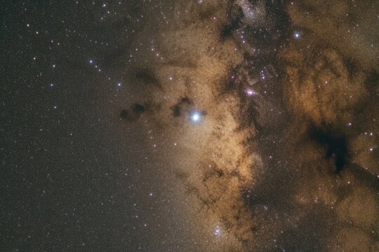 Starry sky with traces of the movement of stars around center of deep space galaxy
