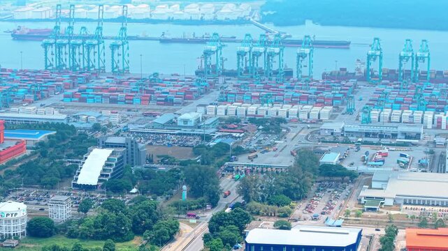 Container Terminal Truck Entrance Aerial Drone Push-In &mdash; Port of Tanjung Pelepas Johor Malaysia Global Trade 4K