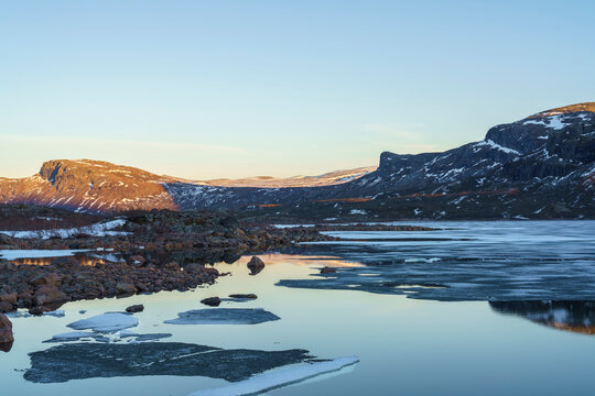Stora Lulevatten Lake during sunset in Lapland, Sweden