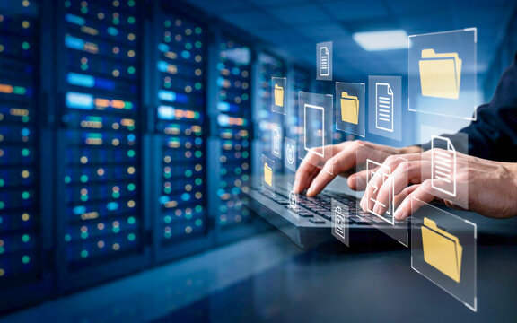 A data center server room background with hands typing on a keyboard surrounded by virtual file icons