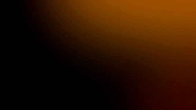 Abstract golden orange gradient background with soft light transitions