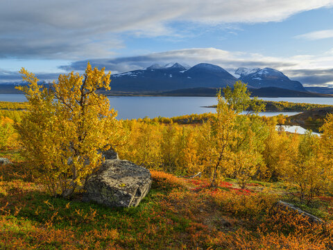 Akka Mountain and autumn trees