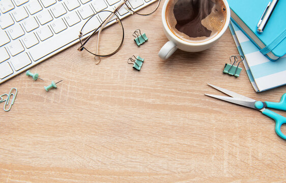 Overhead view of a modern desk with business essentials