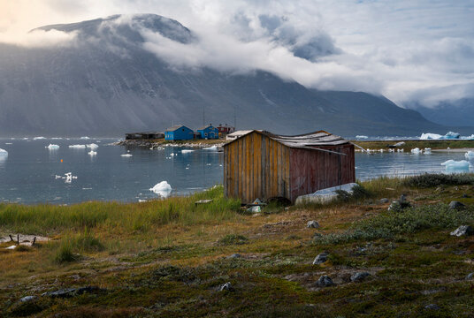 Qoornoq village with floating icebergs in Nuuk fjords, Greenland