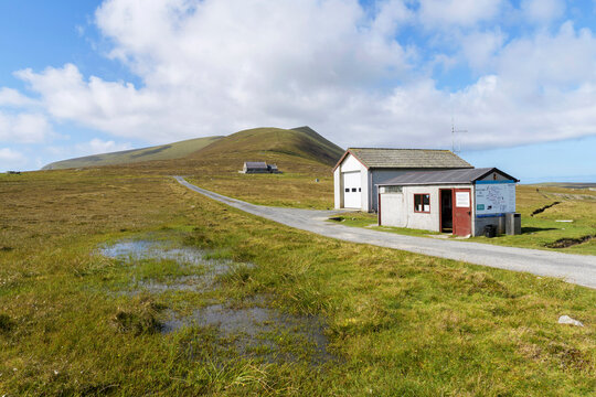Rural landscape with airport terminal by road