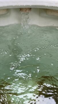 Bubbling hot tub water jet filling spa pool