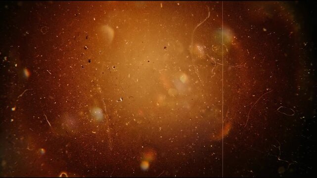 Microscopic analog film grain with embedded dust and scratches, cinematic abstract visual for vintage cinematic nostalgia