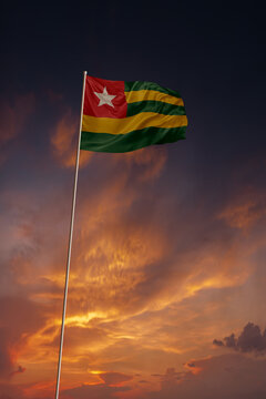 National flag of Togo in evening sky for holiday card design