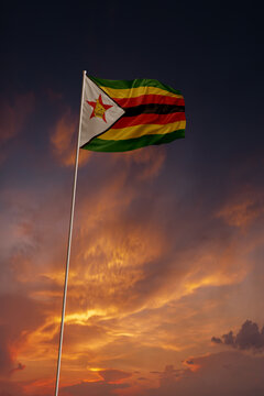National flag of Zimbabwe in evening sky for holiday card design