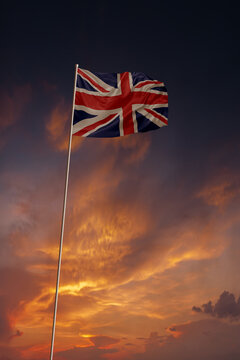 National flag of United Kingdom in evening sky for holiday card design