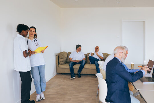 Healthcare team and colleagues relaxing in a medical break room