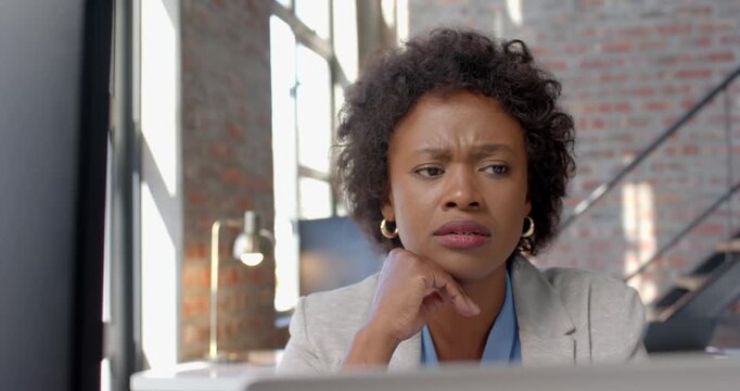 Lifestyle videos indoor of people doing activities at office, woman in office looking at computer sc