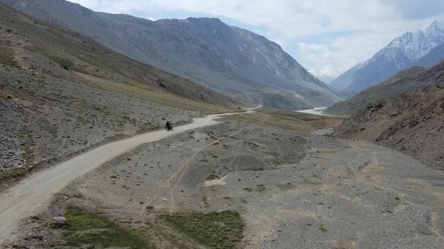 Bike passing through Lahaul and Spiti valley in Himachal Pradesh