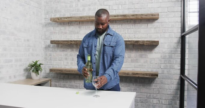 Lifestyle videos indoor of people doing activities at office, holding wine glass, man examining whit