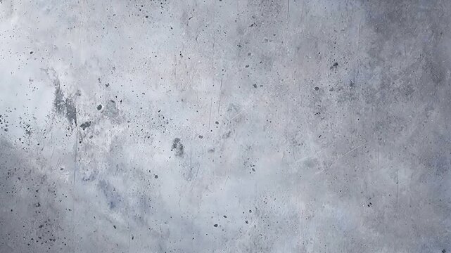 Abstract grey textured surface with scratches and bright side lighting